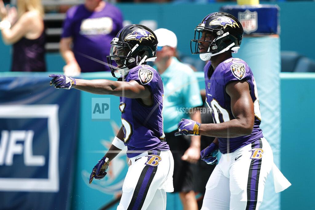 Brynn Anderson Baltimore Ravens wide receiver Marquise Brown (15) gestures after scoring a touchdown, during the first half at an NFL football game, Sunday, Sept. 8, 2019, in Miami Gardens, Fla. To the right is Baltimore Ravens wide receiver Miles Boykin (80). (AP Photo/Brynn Anderson)