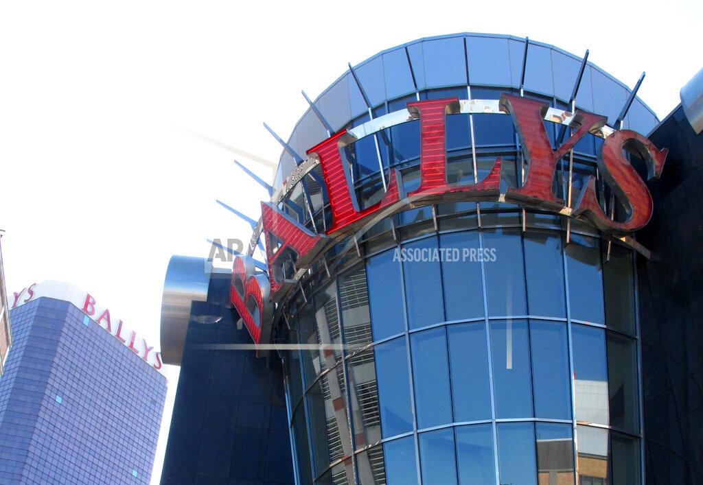 Wayne Parry This Oct. 1, 2020 photo shows the exterior of Bally's casino in Atlantic City, N.J. The new owners of Bally's Atlantic City are attempting to revive a comatose casino in perhaps the most cutthroat gambling market in America. Rhode Island-based Bally's Corporation is spending at least $90 million on the Boardwalk casino over the next five years, including hotel room makeovers, a renovation of the casino floor, new slot machines and restaurants, and more live entertainment. (AP Photo/Wayne Parry)