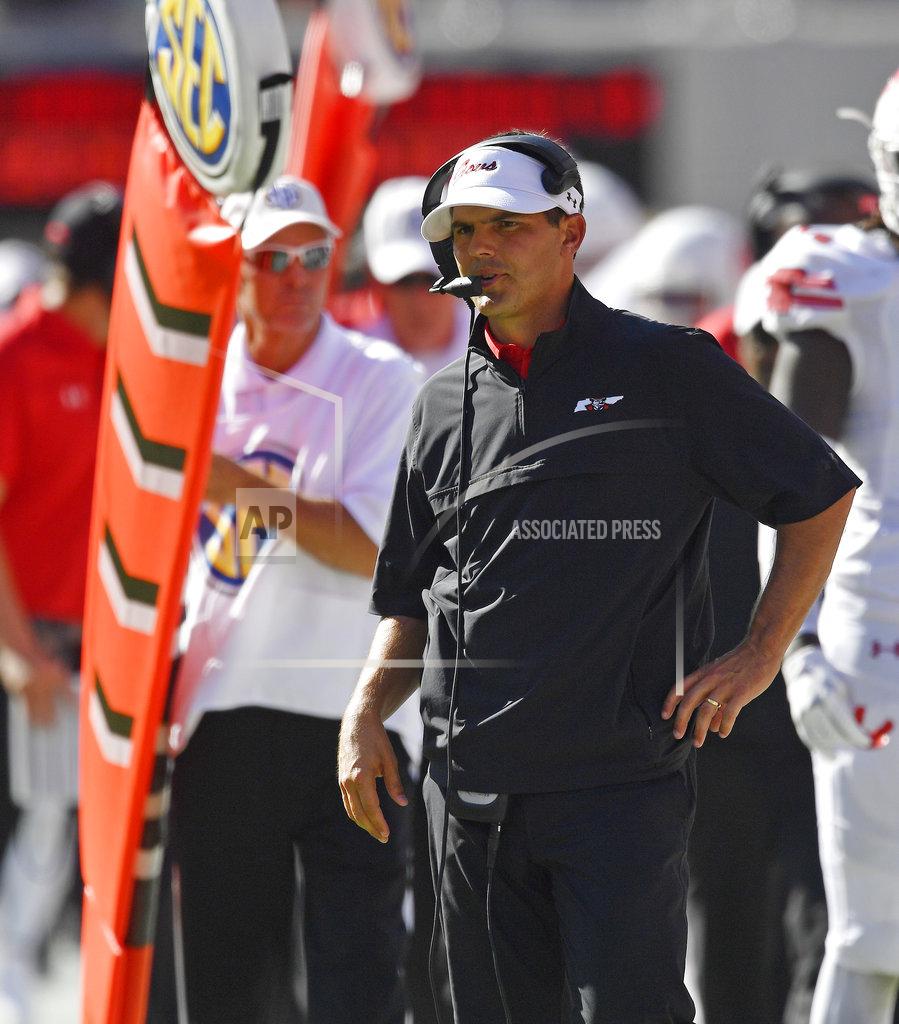 Mike Stewart FILE - In this Sept. 1, 2018, file photo, Austin Peay head coach Will Healy watches Georgia kick an extra point during the first half of an NCAA college football game, in Athens, Ga. The Charlotte 49ers say they have hired Will Healy as their head football coach. Healy most recently coached at Austin Peay, where he was an Eddie Robinson Award winner in 2017 as the National FCS Coach of the Year. Healy was hired after Mike Houston backed out of the job and decided to go to East Carolina. Charlotte 49ers director of athletics Mike Hill says in a release that Healy is "one of the top up-and-coming coaches in the nation."(AP Photo/Mike Stewart, File)