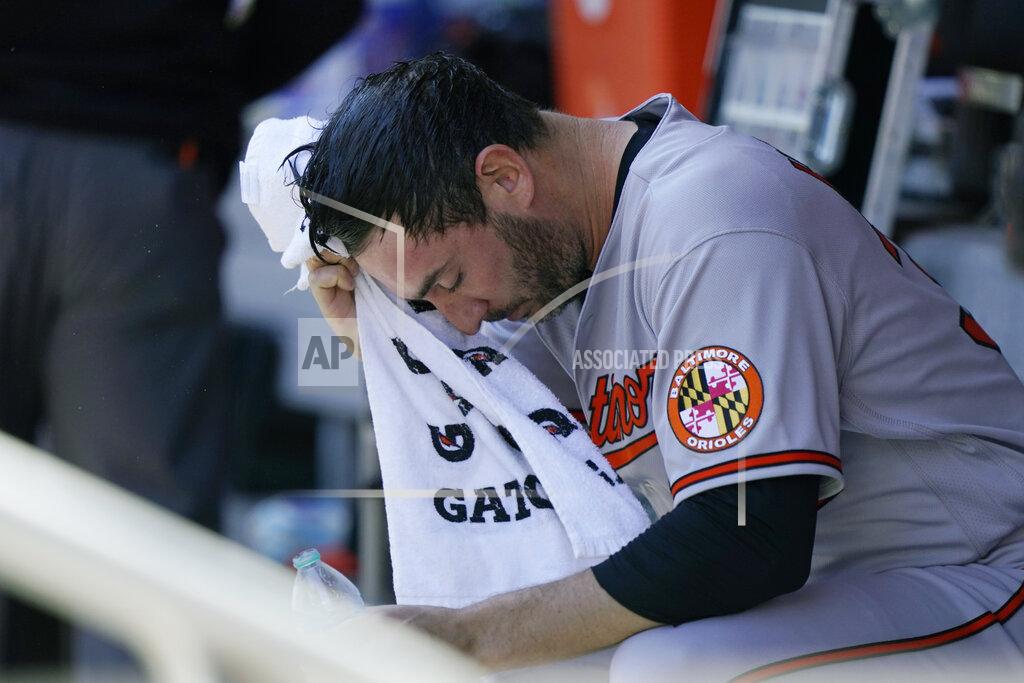 Kathy Willens Baltimore Orioles starting pitcher Matt Harvey wipes his face with a towel in the dugout before a baseball game against his former team, the New York Mets, Wednesday, May 12, 2021, in New York. (AP Photo/Kathy Willens)