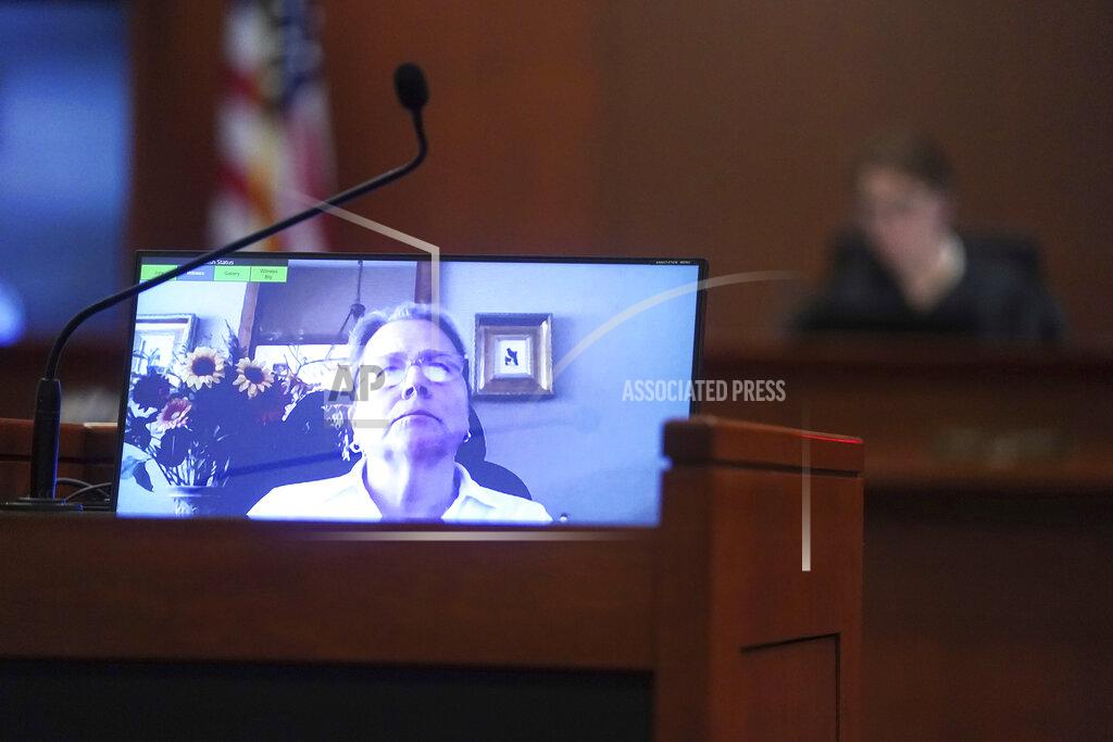 Shaw Thew Disney Executive Tina Newman testifies in a previously recorded video deposition at the Fairfax County Circuit Courthouse in Fairfax, Va., Thursday, May 19, 2022. Actor Johnny Depp sued his ex-wife Amber Heard for libel in Fairfax County Circuit Court after she wrote an op-ed piece in The Washington Post in 2018 referring to herself as a "public figure representing domestic abuse." (Shawn Thew/Pool Photo via AP)
