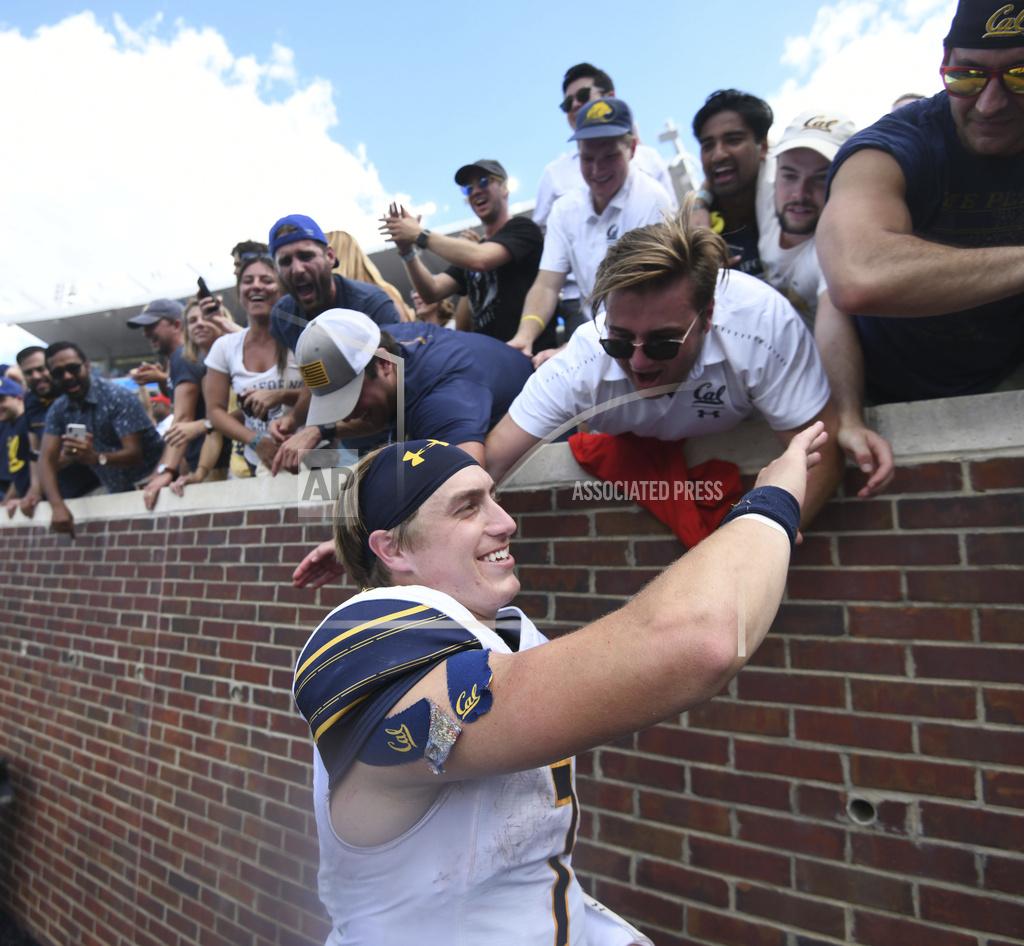 California quarterback Chase Garbers (7) celebrates with fans following a win over Mississippi at Vaught-Hemingway Stadium in Oxford, Miss. on Saturday, September 21, 2019. California won 28-20. (Bruce Newman, Oxford Eagle via AP)