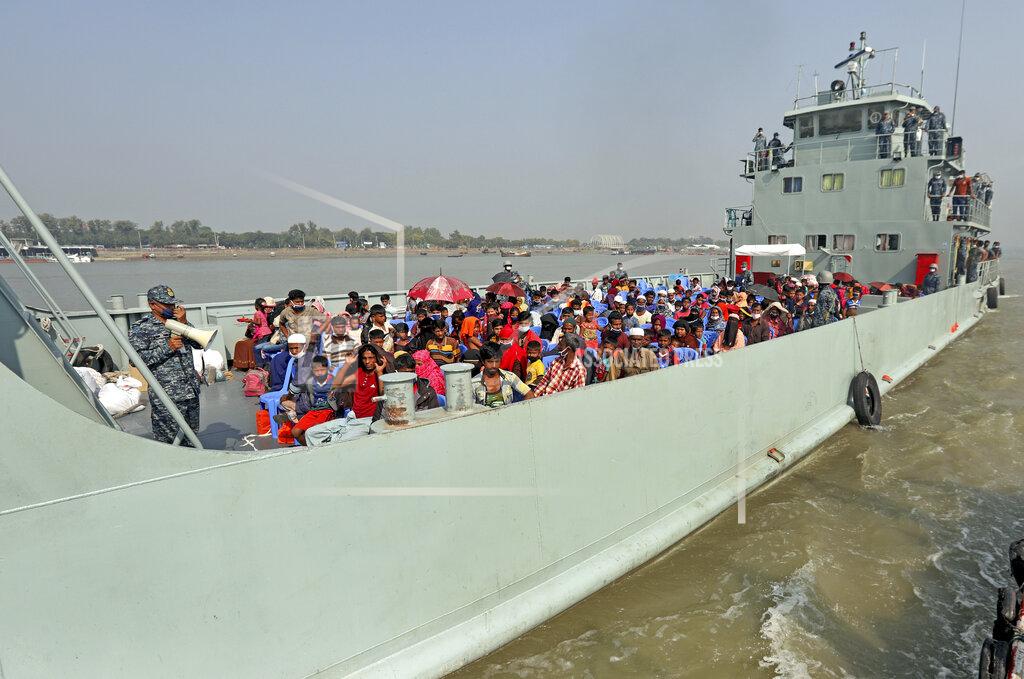 Uncredited Rohingya refugees are transported on a naval vessel to Bhashan Char, or floating island, in the Bay of Bengal, from Chittagong, Bangladesh, Friday, Dec. 4, 2020. Authorities in Bangladesh on Friday started sending a first group of nearly more than 1,500 Rohingya refugees to an isolated island despite calls by human rights groups for a halt to the process. (AP Photo).