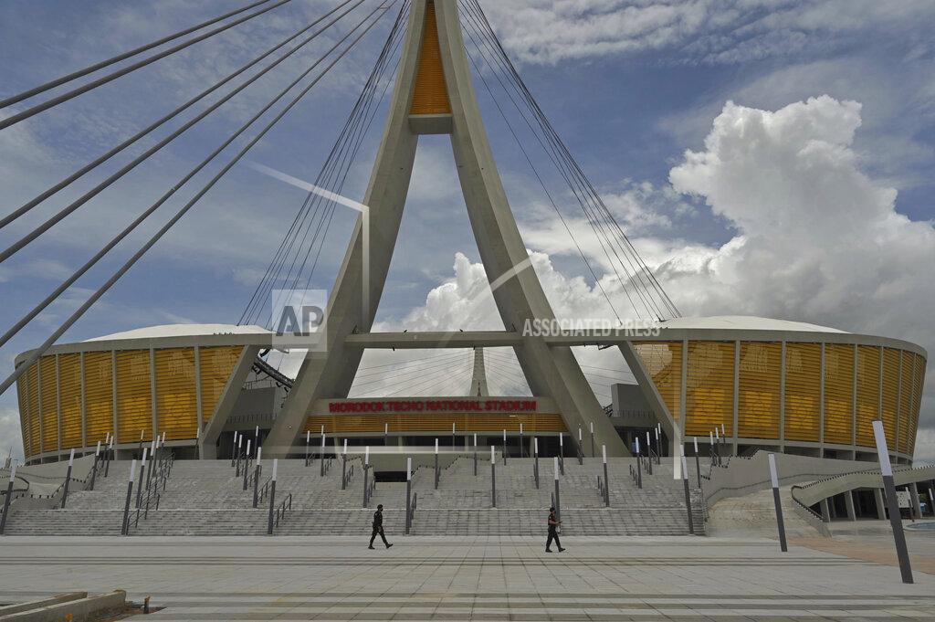 Tang Chhin Sothy The Morodok Techo National Stadium is seen during a ceremony to hand it over to the Cambodian organizing committee of the Southeast Asian Games, in Phnom Penh, Cambodia, Sunday, Sept. 12, 2021. China's Foreign Minister Wang Yi, who attended the ceremony Sunday, met with Prime Minister Hun Sen and other officials to discuss COVID-19 and other regional issues. (Tang Chhin Sothy/Pool Photo via AP)