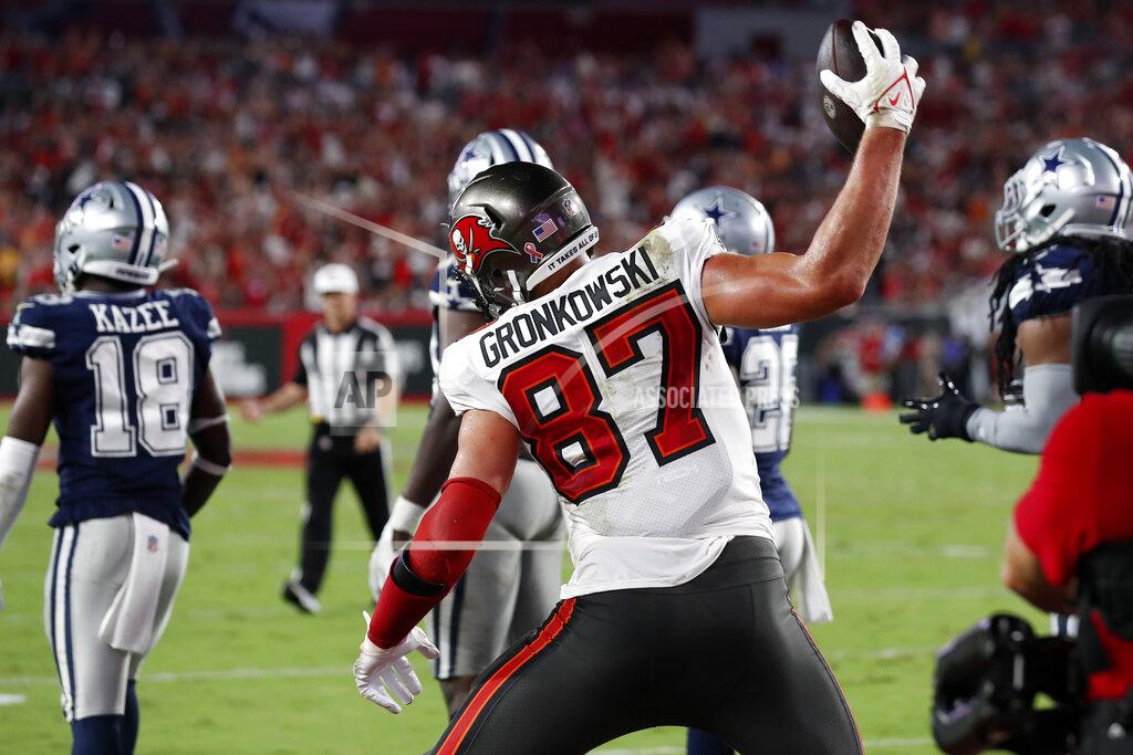 Scott Audette Tampa Bay Buccaneers tight end Rob Gronkowski (87) spikes the football after his 2-yard touchdown reception against the Dallas Cowboys during the first half of an NFL football game Thursday, Sept. 9, 2021, in Tampa, Fla. (AP Photo/Scott Audette)