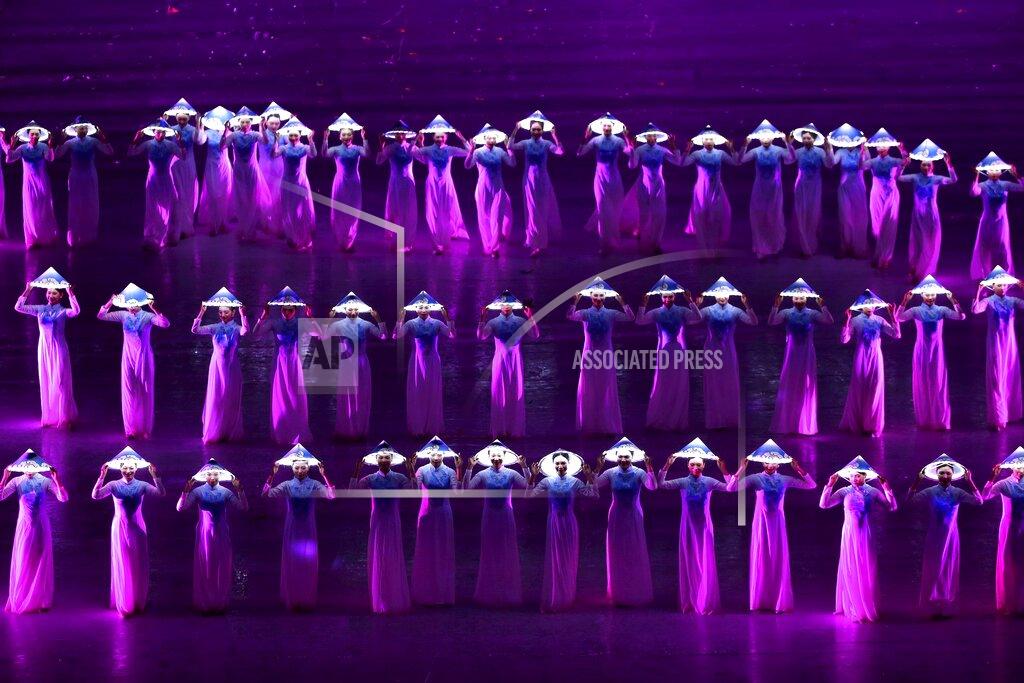 Minh Hoang Dancers perform during the 31st Southeast Asian Games (SEA Games 31) in Hanoi, Vietnam, Thursday, May 12, 2022. The SEA Games 31 takes place from May 12-23 in Hanoi, and 11 nearby provinces. (AP Photo/Minh Hoang)