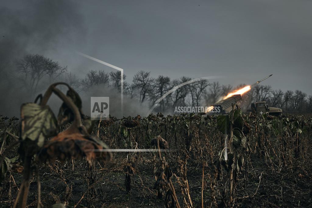 Libkos Ukrainian military's Grad multiple rocket launcher fires rockets at Russian positions in the frontline near Bakhmut, Donetsk region, Ukraine, Thursday, Nov. 24, 2022. (AP Photo/LIBKOS)