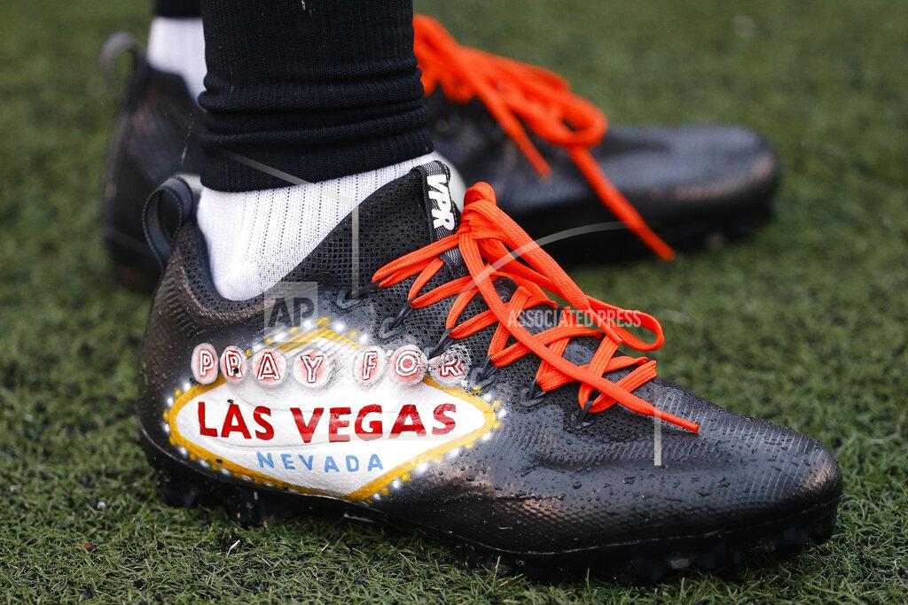 Frank Victores FILE - This Oct. 8, 2017, file photo, shows cleats of Cincinnati Bengals cornerback Dre Kirkpatrick honoring the victims of the mass shooting in Las Vegas, before an NFL football game against the Buffalo Bills in Cincinnati. The NFL is planning to allow players to have decals on the back of their helmets bearing names or initials of victims of systemic racism and police violence. The league has been in talks with individual players and their union since June about somehow honoring such victims.(AP Photo/Frank Victores, File)