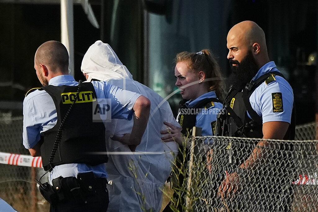 Claus Bech A view of police at Field's shopping center in Copenhagen, Denmark, Sunday July 3, 2022. Danish police say several people have been shot at a Copenhagen shopping mall. Copenhagen police said that one person has been arrested in connection with the shooting at the Field's shopping mall on Sunday. Police tweeted that several people have been hit but gave no other details. (Claus Bech/Ritzau Scanpix via AP)