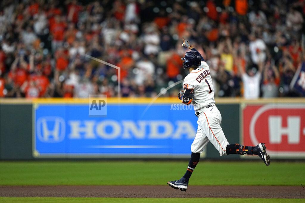 David J. Phillip Houston Astros' Carlos Correa (1) celebrates after hitting a three-run home run against the Arizona Diamondbacks during the first inning of a baseball game Sunday, Sept. 19, 2021, in Houston. (AP Photo/David J. Phillip)