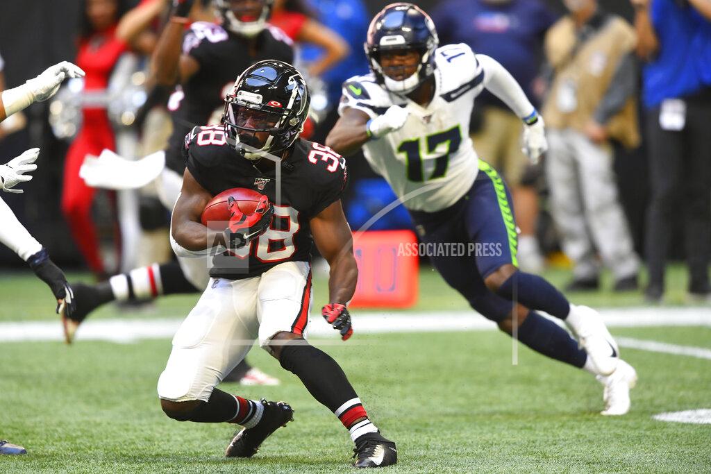 John Amis Atlanta Falcons running back Kenjon Barner (38) runs against the Seattle Seahawks during the first half of an NFL football game, Sunday, Oct. 27, 2019, in Atlanta. (AP Photo/John Amis)