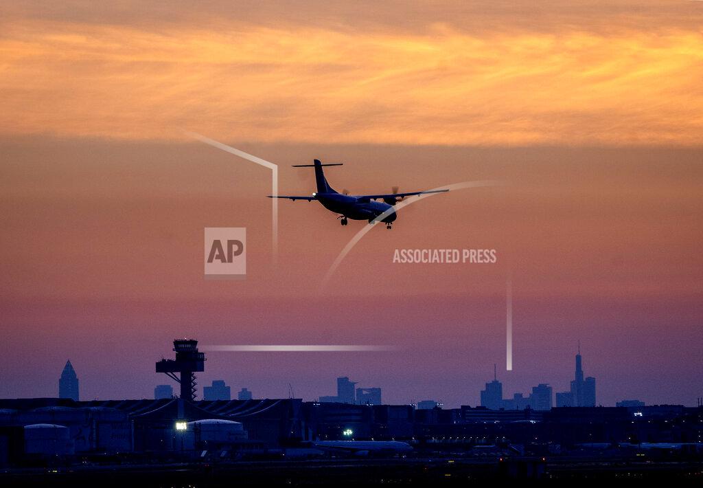 Michael Probst FILE - An aircraft lands at the international airport in Frankfurt, Germany, before sunrise on Tuesday, June 21, 2022. After two years of pandemic restrictions, travel demand is back with a vengeance but airlines and airports that slashed jobs during the depths of the COVID-19 crisis are struggling to keep up. With the busy summer tourism season underway in Europe, passengers are encountering chaotic scenes at airports, including lengthy delays, canceled flights and headaches over lost luggage. (AP Photo/Michael Probst, File)