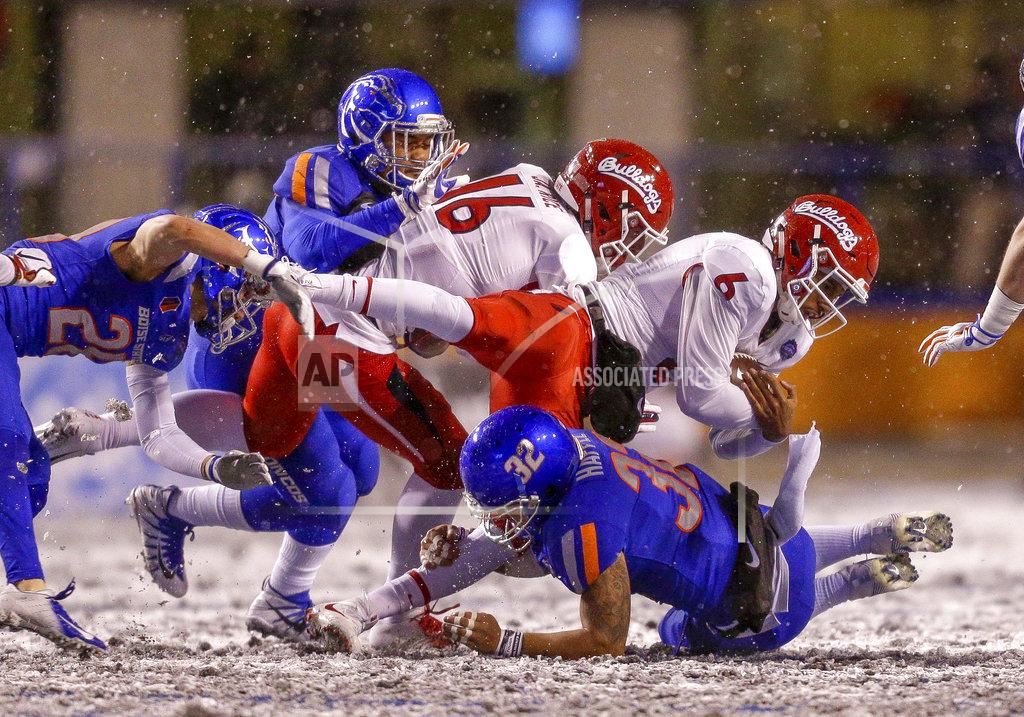 Steve Conner Fresno State quarterback Marcus McMaryion (6) is tackled by Boise State safety Jordan Happle (32) during the second half of an NCAA college football game for the Mountain West championship, Saturday, Dec. 1, 2018, in Boise, Idaho. Fresno State won 19-16. (AP Photo/Steve Conner)