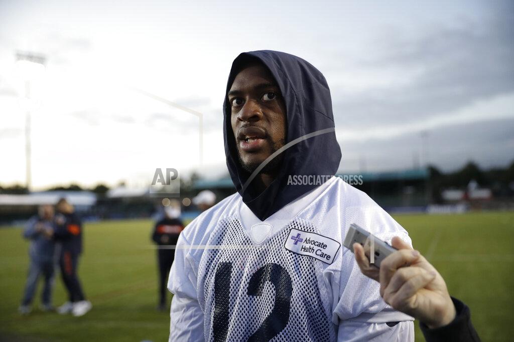FILE - In this Oct. 4, 2019, file photo, Chicago Bears wide receiver Allen Robinson speaks to the media after an NFL training session at the Allianz Park stadium in London. Many players polled by The Associated Press over the last couple of weeks say they are scared to return to work without a cure or a vaccine for the coronavirus. By and large, however, those same players say they trust the protocols the NFL will have in place by the time practices resume and games return. (AP Photo/Matt Dunham, File)