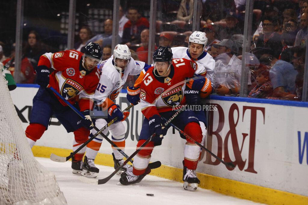 Brynn Anderson Florida Panthers defenseman Mark Pysyk (13) skates with the puck against the New York Islanders during the first period of an NHL hockey game on Thursday, April 4, 2019, in Sunrise, Fla. (AP Photo/Brynn Anderson)
