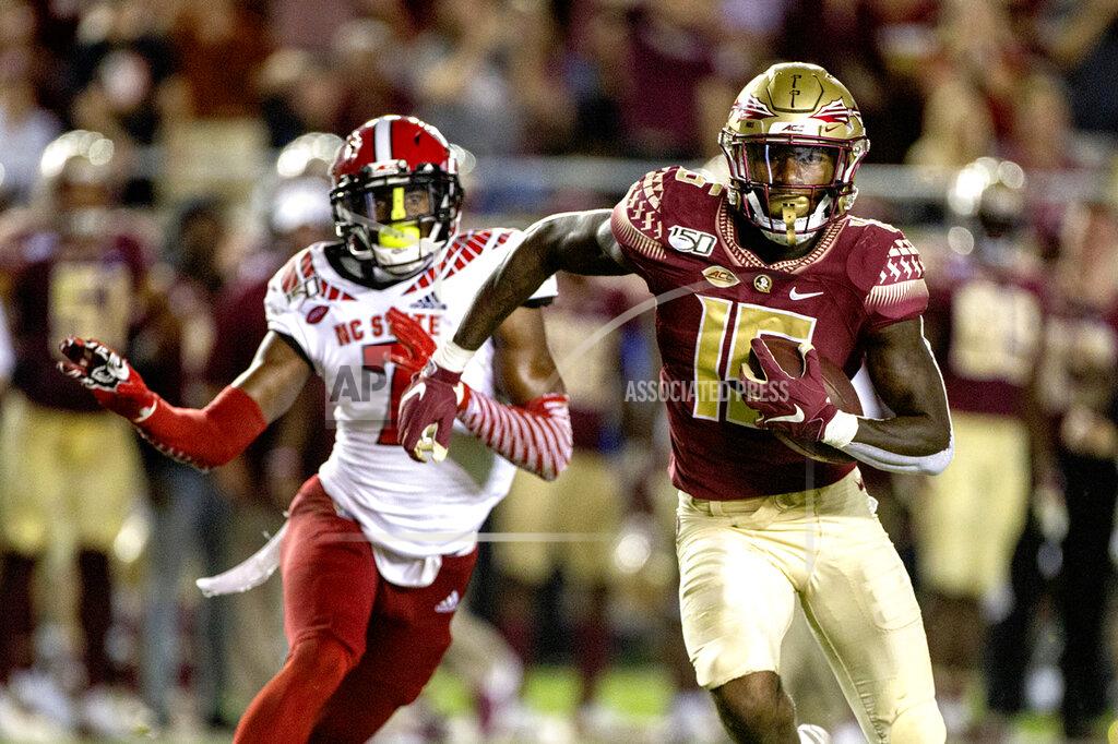 Mark Wallheiser Florida State wide receiver Tamorrion Terry (15) outruns North Carolina State cornerback Chris Ingram (7) to the end zone for a touchdown in the first half of an NCAA college football game in Tallahassee, Fla., Saturday, Sept. 28, 2019. (AP Photo/Mark Wallheiser)