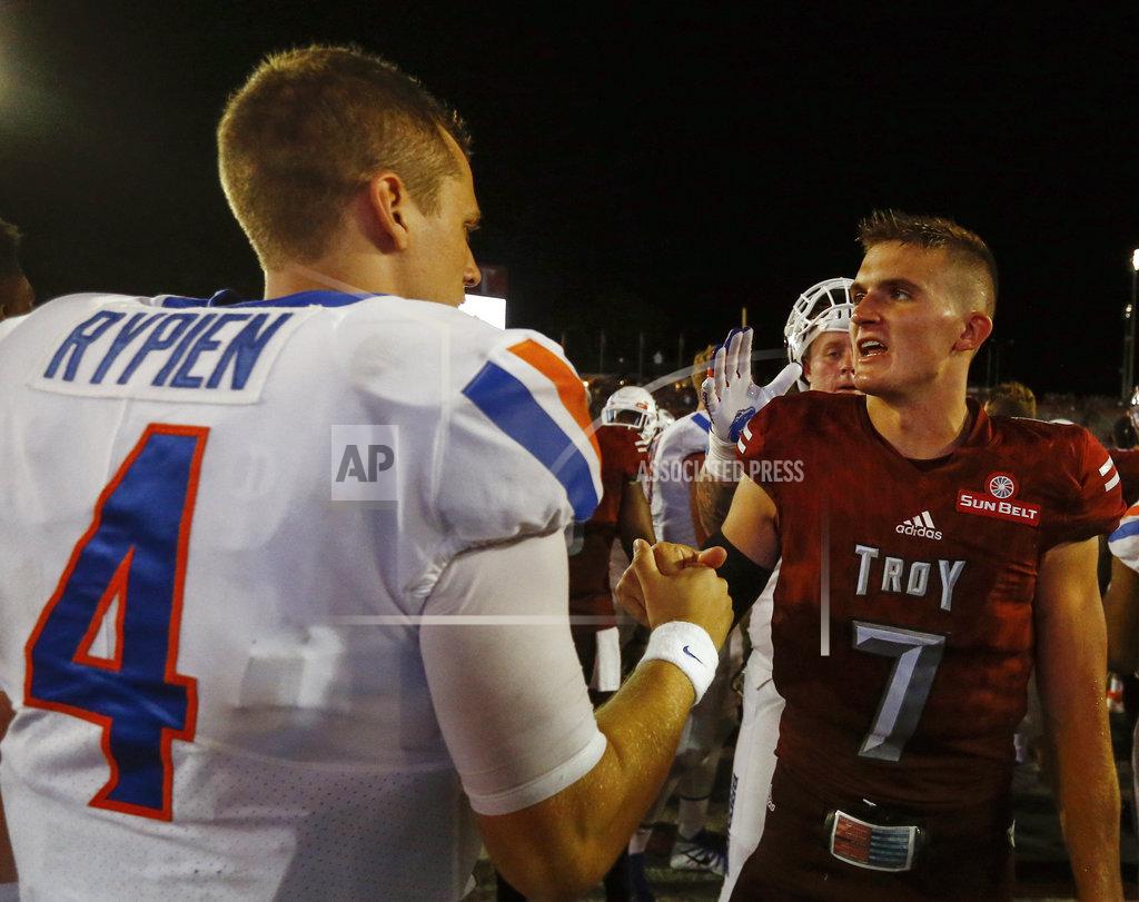 Butch Dill Boise State quarterback Brett Rypien (4) shakes hands with Troy quarterback Kaleb Barker (7) after an NCAA college football game, Saturday, Sept. 1, 2018, in Troy, Ala. (AP Photo/Butch Dill)