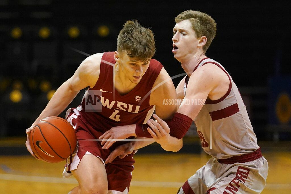 Jeff Chiu Washington State forward Aljaz Kunc (4) drives against Stanford guard Noah Taitz during the first half of an NCAA college basketball game in Santa Cruz, Calif., Saturday, Jan. 9, 2021. (AP Photo/Jeff Chiu)