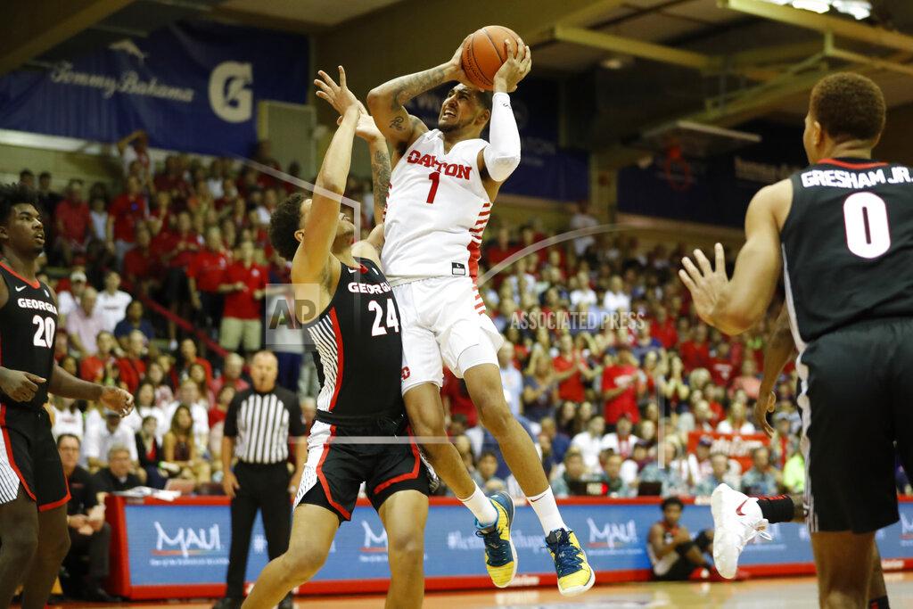 Marco Garcia Dayton forward Obi Toppin (1) goes to the basket over Georgia forward Rodney Howard (24) during the first half of an NCAA college basketball game Monday, Nov. 25, 2019, in Lahaina, Hawaii. (AP Photo/Marco Garcia)