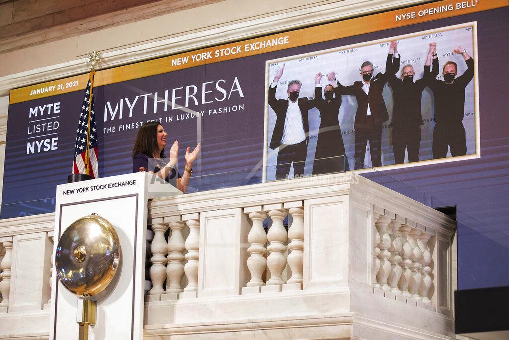 Courtney Crow Stacey Cunningham, NYSE President, applauds as Michael Kliger, CEO, Mytheresa virtually rings the opening bell at the New York Stock Exchange on Thursday, Jan. 21, 2021. (Courtney Crow/New York Stock Exchange via AP)