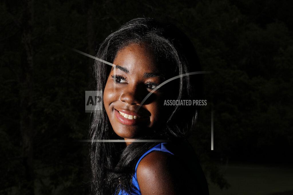 Brynn Anderson Audrey McNeal on Friday, July 24, 2020, in Marietta, Ga. McNeal has aspirations to become secretary of state one day. Then, maybe, president. "It's about time we represent ourselves," McNeal said. (AP Photo/Brynn Anderson)