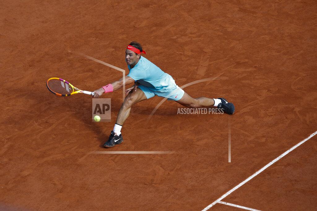 Alessandra Tarantino Spain's Rafael Nadal plays a shot against Argentina's Diego Schwartzman in the semifinal match of the French Open tennis tournament at the Roland Garros stadium in Paris, France, Friday, Oct. 9, 2020. (AP Photo/Alessandra Tarantino)