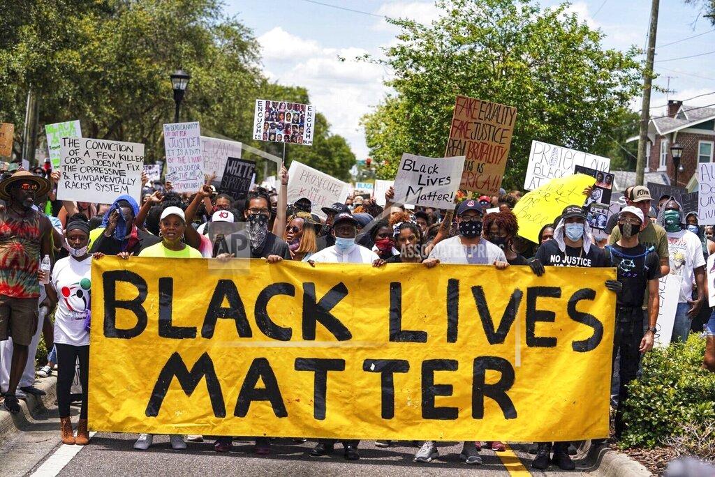 Martha Asencio-Rhine Demonstrators march in Tampa Sunday, May 31, 2020 for a second day in a row as protestors take to the streets of Tampa to protest the Memorial Day death of George Floyd in Minneapolis. (Martha Asencio-Rhine/Tampa Bay Times via AP)