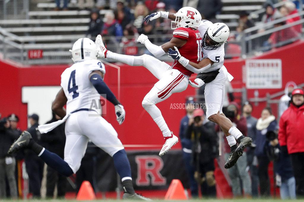Julio Cortez Rutgers wide receiver Bo Melton, center, makes a catch as Penn State cornerback Tariq Castro-Fields (5) and safety Nick Scott (4) defend during the second half of an NCAA college football game, Saturday, Nov. 17, 2018, in Piscataway, N.J. (AP Photo/Julio Cortez)
