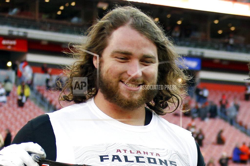 Ron Schwane FILE - In this Nov. 11, 2018, file photo, Atlanta Falcons offensive tackle Ty Sambrailo is shown after an NFL football game in Cleveland. The Atlanta Falcons are releasing running back Devonta Freeman and three more veterans to clear salary cap room. The Falcons also will release cornerback Desmond Trufant and have announced they have cut offensive tackle Ty Sambrailo and tight end Luke Stocker. Freeman and Trufant are former Pro Bowl players who had been considered foundation players for the franchise.(AP Photo/Ron Schwane, File)