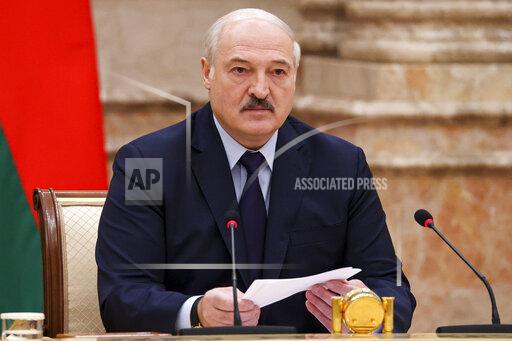 Belarusian President Alexander Lukashenko speaks during an expanded meeting of the Constitutional Commission in Minsk, Belarus, Tuesday, Sept. 28, 2021.The authoritarian leader of Belarus announced a referendum on a new constitution in Feb. 2022 and promised not to let the opposition come to power. Alexander Lukashenko told a government meeting Tuesday he had drafted a new constitution that redistributes powers between the main branches of the government and establishes a new governing body, the All-Belarus People's Assembly. (Maxim Guchek/BelTA photo via AP)