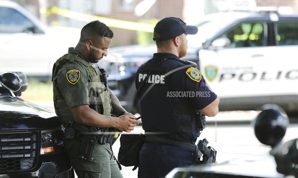 Elizabeth Conley Police investigate a shooting Timber Ridge Apartments in Houston on Monday, Sept. 20, 2021. Authorities say a Houston police officer was killed and another was wounded during a shooting that also killed a 31-year-old man who the officers were attempting to arrest. (Elizabeth Conley/Houston Chronicle via AP)