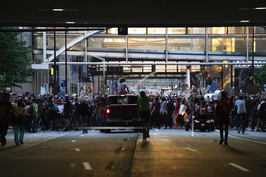 Mark Vancleave Demonstrators march through downtown Minneapolis on Thursday, May 28, 2020, protesting the death of George Floyd in police custody Monday. (Mark Vancleave/Star Tribune via AP)