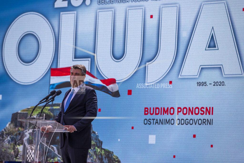 Darko Bandic Croatian President Zoran Milanovic addresses the dignitaries and military personnel during a ceremony in Knin, Croatia, Wednesday, Aug. 5, 2020. Croatia marked the 25th anniversary of a victorious wartime military offensive, with an ethnic Serb politician attending the ceremony for the first time in what is seen as an important step toward reconciliation. (AP Photo/Darko Bandic)