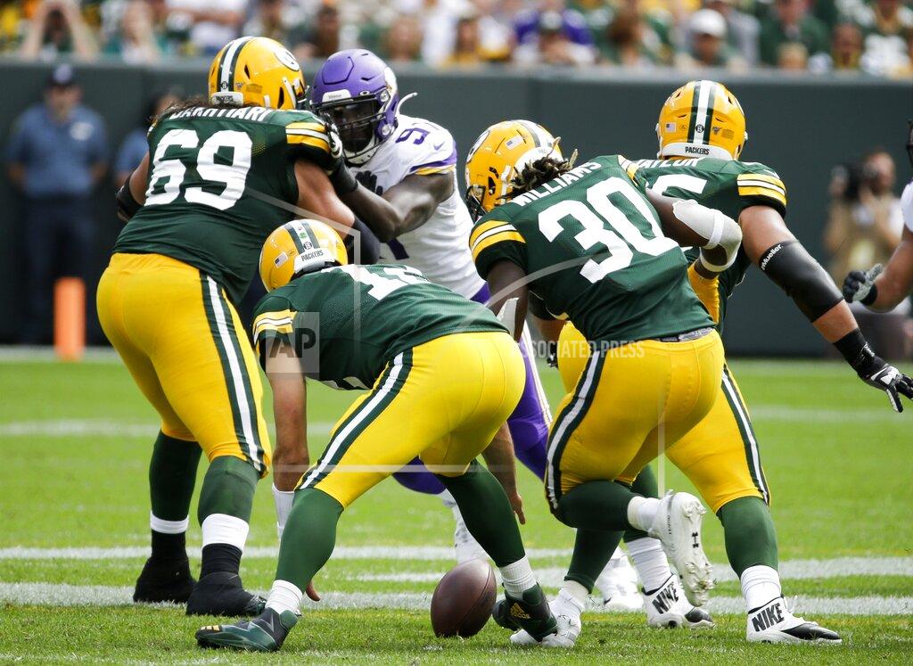 Mike Roemer Green Bay Packers' Aaron Rodgers fumbles during the second half of an NFL football game against the Minnesota Vikings Sunday, Sept. 15, 2019, in Green Bay, Wis. The Vikings recovered the fumble. (AP Photo/Mike Roemer)
