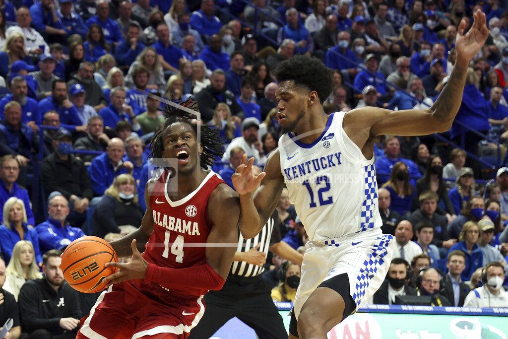 James Crisp Alabama's Keon Ellis (14) is pressured by Kentucky's Keion Brooks Jr. (12) during the second half of an NCAA college basketball game in Lexington, Ky., Saturday, Feb. 19, 2022. Kentucky won 90-81. (AP Photo/James Crisp)