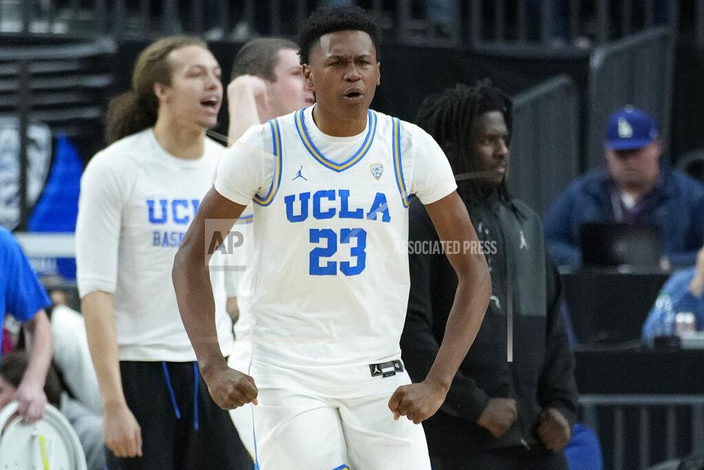 John Locher UCLA's Peyton Watson (23) reacts after a play against Southern California during the first half of an NCAA college basketball game in the semifinal round of the Pac-12 tournament Friday, March 11, 2022, in Las Vegas. (AP Photo/John Locher)
