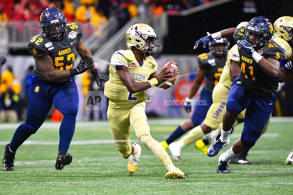 John Amis Alcorn State quarterback Felix Harper tries to evade the defense of North Carolina A&T linebacker Julian Monell (53) and defensive lineman Leon Smalls (41) during the second half of the Celebration Bowl NCAA college football game, Saturday, Dec. 21, 2019, in Atlanta. North Carolina A&T won 64-44. (John Amis/Atlanta Journal-Constitution via AP)