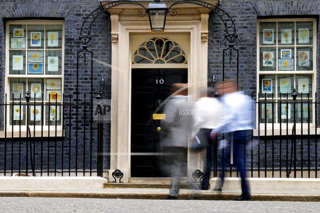 Frank Augstein People arrive at 10 Downing Street in London, Monday, May 23, 2022. The general public is awaiting the release of Sue Gray's report into COVID lockdown breaches across Whitehall, the so called "Partygate". (AP Photo/Frank Augstein)