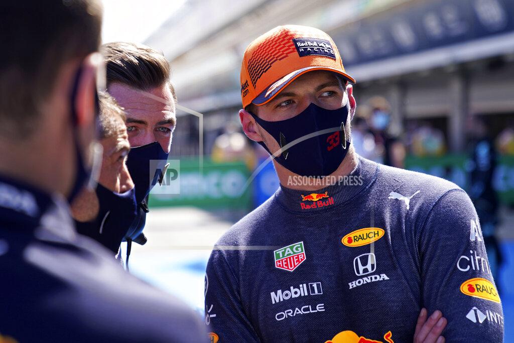 Emilio Morenatti Red Bull driver Max Verstappen of the Netherlands talks with his team staff after he clocked the second fastest time in the qualifying for the Spanish Formula One Grand Prix at the Barcelona Catalunya racetrack in Montmelo, just outside Barcelona, Spain, Saturday, May 8, 2021. The Spanish Grand Prix will be held on Sunday. (AP Photo/Emilio Morenatti, Pool)