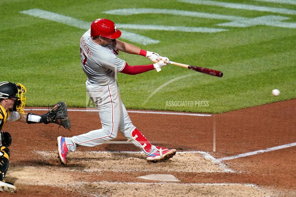 Gene J. Puskar Philadelphia Phillies' Rhys Hoskins hits an RBI single off Pittsburgh Pirates relief pitcher Wil Crowe during the seventh inning of a baseball game in Pittsburgh, Friday, July 29, 2022. (AP Photo/Gene J. Puskar)