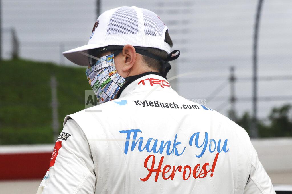 Brynn Anderson Kyle Busch wears a message to coronavirus pandemic responders on his back as he waits for the start of the NASCAR Xfinity series auto race Thursday, May 21, 2020, in Darlington, S.C. (AP Photo/Brynn Anderson)