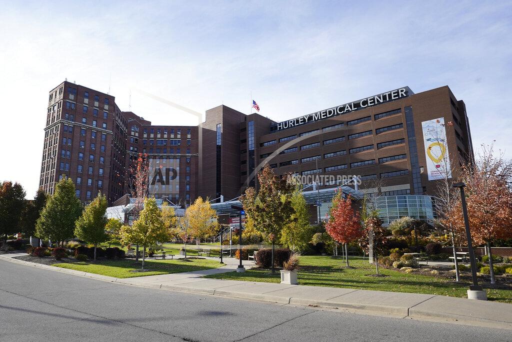 Paul Sancya This photo shows Hurley Medical Center in Flint, Mich., Wednesday, Oct. 28, 2020. U.S. hospitals are scrambling to hire more nurses as the coronavirus pandemic surges, leading to stiff competition and increased costs. Adding to the strain, experienced nurses are "burned out with this whole (pandemic)” and some are quitting, said Kevin Fitzpatrick, an emergency room nurse at the center, where several left just in the past month to work in hospice or home care or at outpatient clinics. (AP Photo/Paul Sancya)