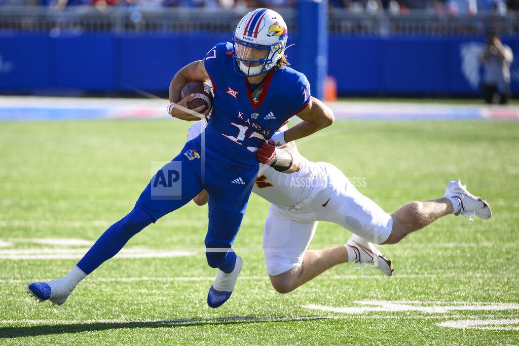 Reed Hoffmann Kansas quarterback Jason Bean (17) is tackled by Iowa State linebacker Colby Reeder (4) during the second half of an NCAA college football game, Saturday, Oct. 1, 2022, in Lawrence, Kan. (AP Photo/Reed Hoffmann)