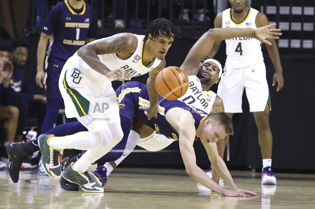 Rod Aydelotte Baylor forward Jalen Bridges, left, grabs a loose ball over Northern Colorado guard Dalton Knecht, center, who blocks out forward Flo Thamba in the second half of an NCAA college basketball game, Monday, Nov. 14, 2022, in Waco, Texas. (AP Photo/Rod Aydelotte(