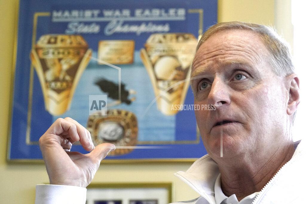David J. Phillip Marist School football coach Alan Chadwick talks about Los Angeles Rams coach Sean McVay's high school career at Marist during an interview for the NFL Super Bowl 53 football game Friday, Feb. 1, 2019, in Atlanta. McVay was the starting quarterback his senior year at Marist when the team won the state championship in 2003. (AP Photo/David J. Phillip)