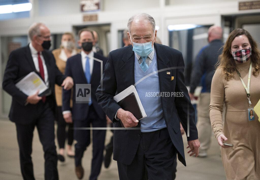 J. Scott Applewhite Sen. Chuck Grassley, R-Iowa, heads to the chamber as the Senate holds a voting marathon on the Democrats' $1.9 trillion COVID-19 relief bill that's expected to end with the chamber's approval of the measure, at the Capitol in Washington, Friday, March 5, 2021. (AP Photo/J. Scott Applewhite)