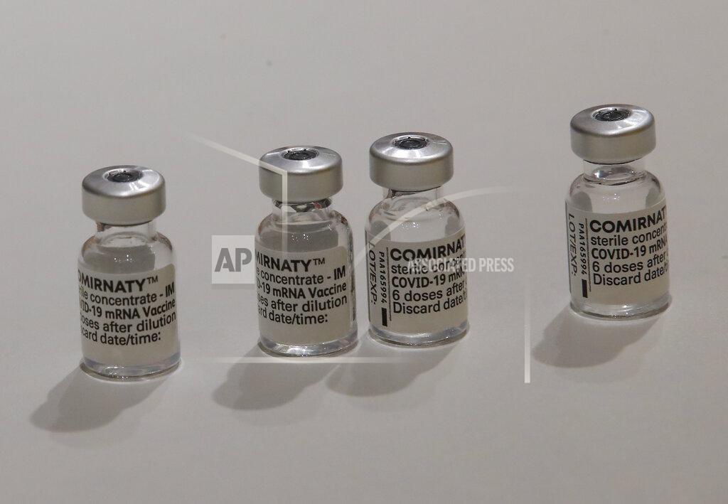 Michel Euler Pfizer COVID-19 vaccine doses are pictured at a new giant vaccination center run by the Paris' fire brigades in Paris, Thursday, May 6, 2021. France joined the United States on Thursday in supporting an easing of patent and other protection on Covid-19 vaccines that could help poorer countries get more doses and speed the en of the pandemic. (AP Photo/Michel Euler)