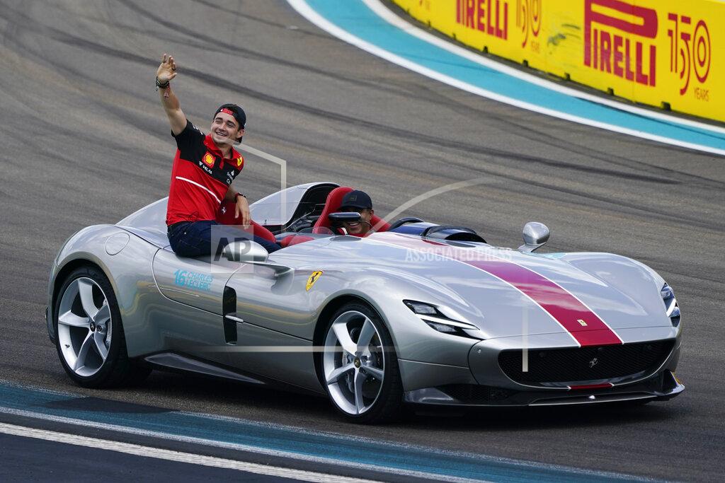 Lynne Sladky Ferrari driver Charles Leclerc of Monaco waves to spectators while taking part in the drivers' parade ahead of the Formula One Miami Grand Prix auto race at the Miami International Autodrome, Sunday, May 8, 2022, in Miami Gardens, Fla. (AP Photo/Lynne Sladky)