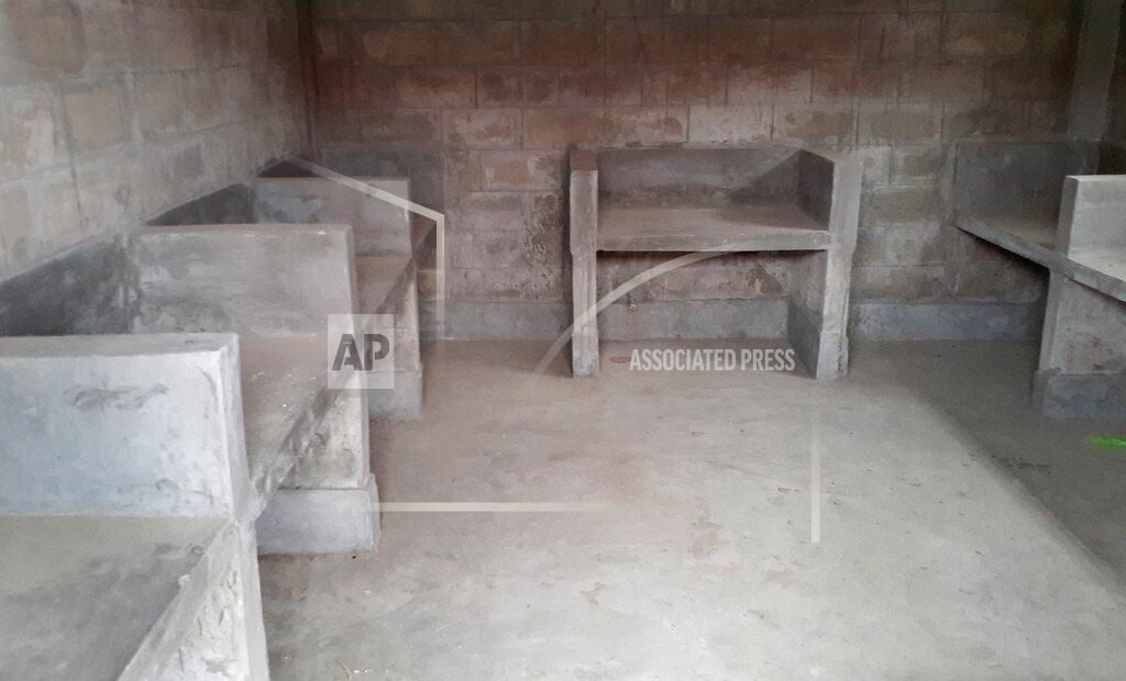 Saleh Noman FILE- In this Thursday, Dec. 19, 2019, file photo, a common cooking area is seen inside a newly constructed building on Bhasan Char, or floating island, in the Bay of Bengal, Bangladesh. Authorities in Bangladesh have begun relocating thousands of Rohingya refugees to an isolated island despite calls by human rights groups for a halt to the process. (AP Photo/Saleh Noman)