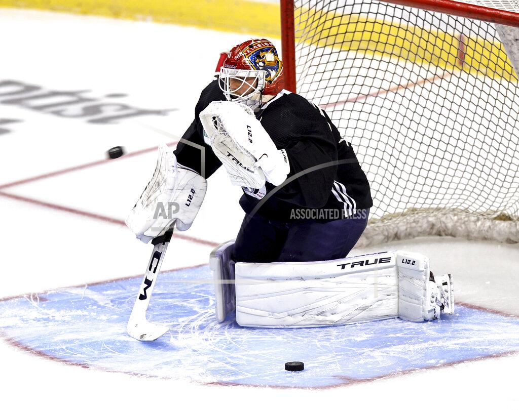 David Santiago Florida Panthers goaltender Sergei Bobrovsky (72) makes a save during an NHL hockey training camp Thursday, Sept. 23, 2021, in Sunrise, Fla. (David Santiago/Miami Herald via AP)